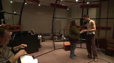 Niels Muus conducts two opera singers in a CIRMMT laboratory 